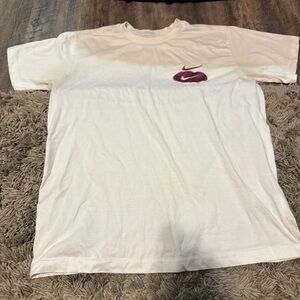 Nike White T-Shirt with Magenta Logo